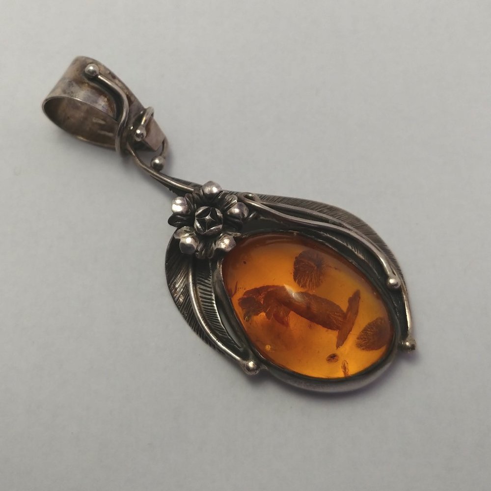 Baltic Honey Amber Pendant in a SS Setting